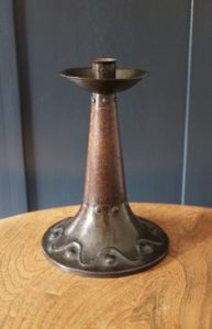 A E Jones copper and oak candlestick