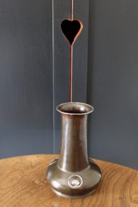 A E Jones copper and silver vase