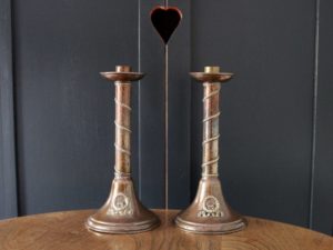 A E Jones copper candlestick