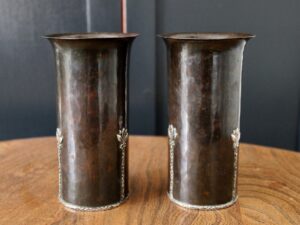 A E Jones copper and silver vases