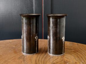 A E Jones copper and silver vases