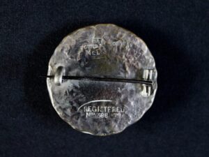 N& E Spittle brooch