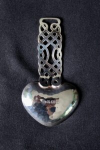 A E Jones silver caddy spoon