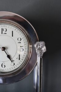 A E Jones silver plated clock