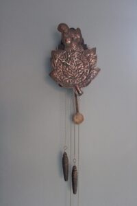 Newton School copper wall clock