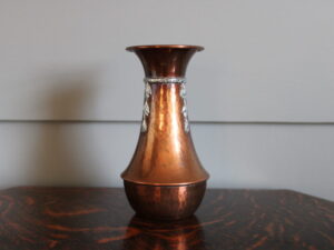 A E Jones copper and silver vase