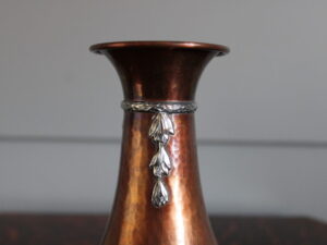 A E Jones copper and silver vase