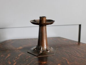 Alfred Hughes copper candlestick