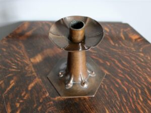 Alfred Hughes copper candlestick