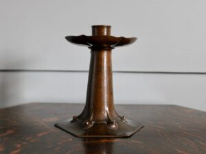 Alfred Hughes copper candlestick