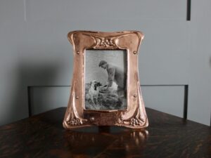 Potteries Guild of Cripples copper frame