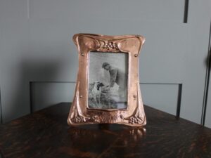 Potteries Guild of Cripples copper frame