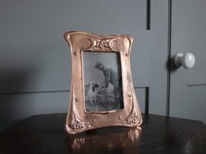 Potteries Guild of Cripples copper frame